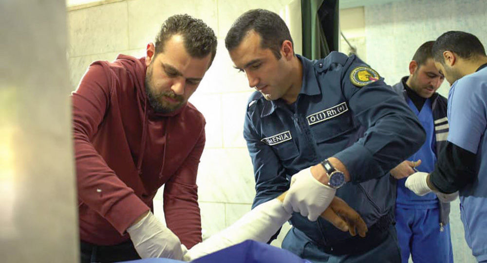 Российские и армянские врачи вместе оказывают бесплатную медпомощь военным запаса сирийской армии 